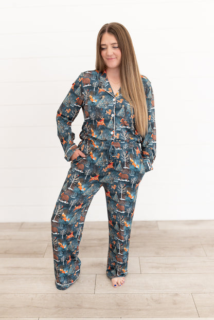 Woman standing in the Woodland Wonder bamboo women's button-front pajama shirt with matching pants