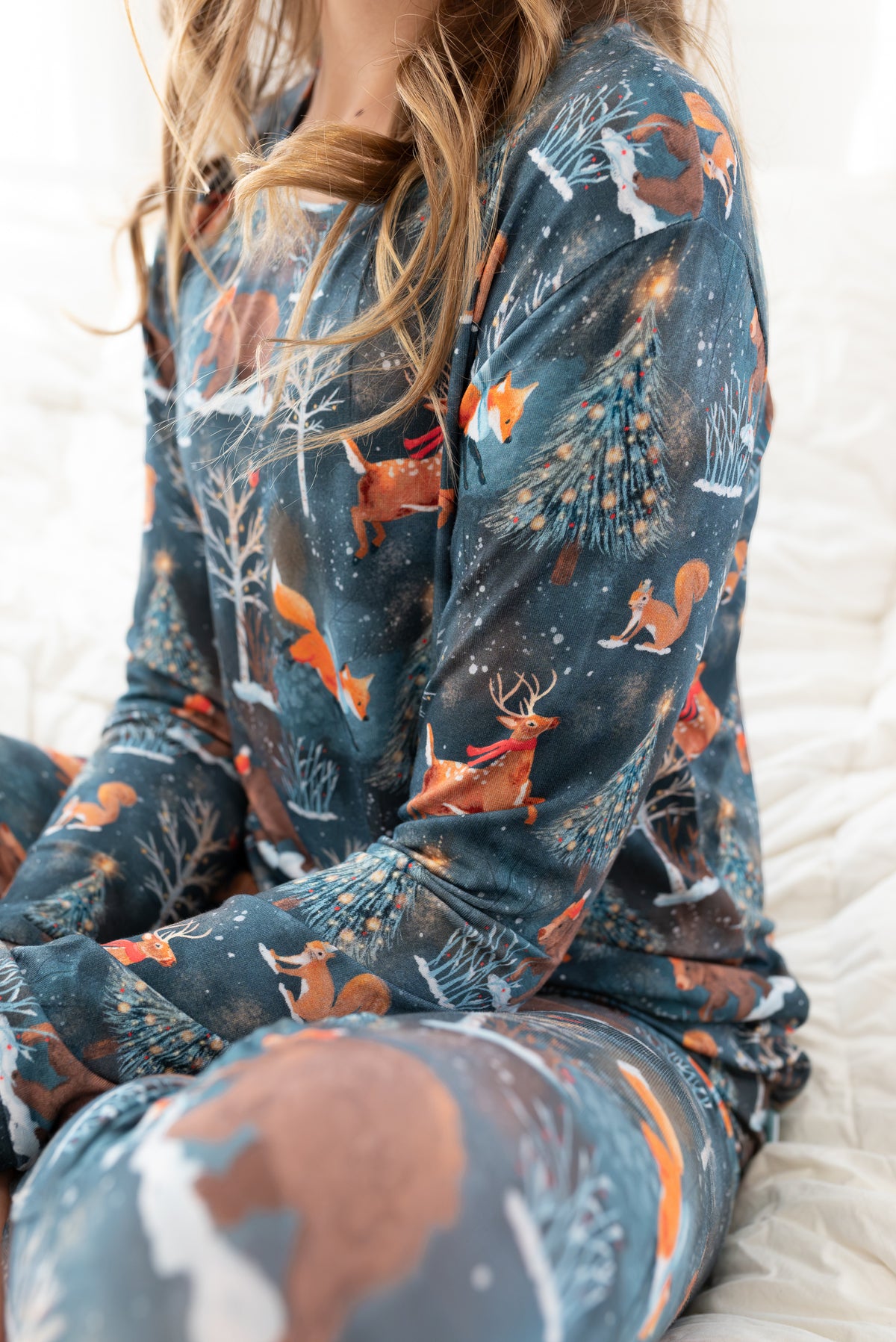 Close-up of Woodland Wonder bamboo teen pajamas showing deer, fox and woodland animal print