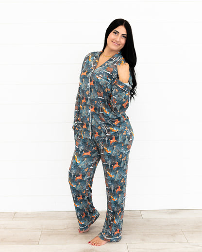 Woman standing and smiling in the Woodland Wonder bamboo women's pajama set