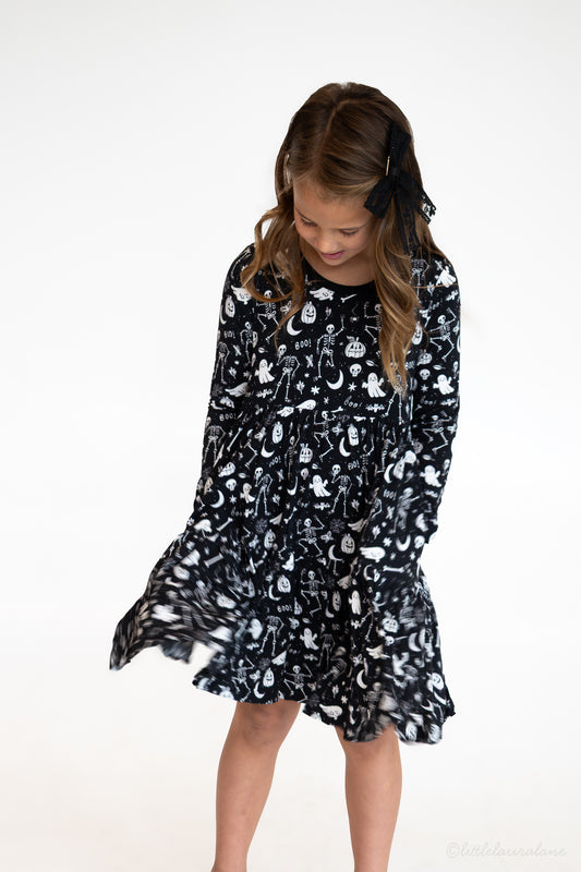 Skeleton Party Black & White Halloween Bamboo Girls Dress – twirl view, black dress with white skeleton print