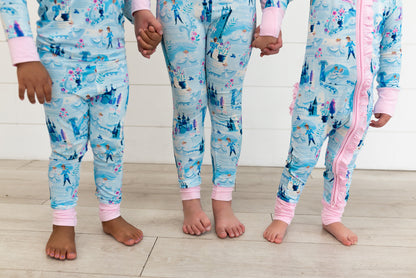 Two Piece Princess Pajama – The Wish Collection – on-model close-up, three children in matching blue castle-print pajamas