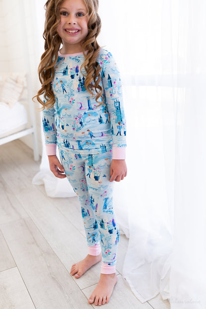 Two Piece Princess Pajama – The Wish Collection – on-model full-length front view, blue castle-print pajamas
