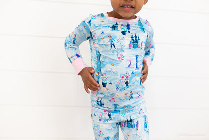 Two Piece Princess Pajama – The Wish Collection – on-model close-up of blue castle-print two-piece pajamas