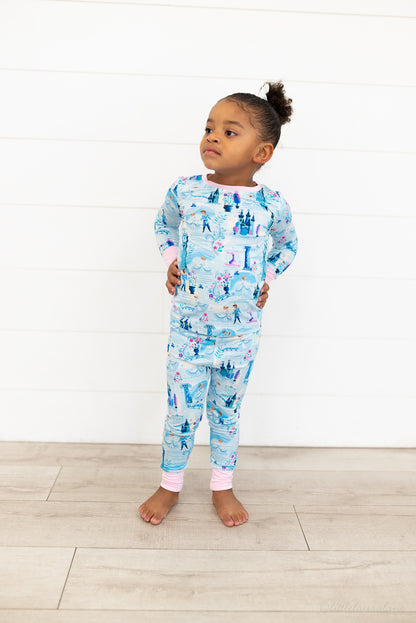 Two Piece Princess Pajama – The Wish Collection – on-model full-length front view, child in blue castle-print pajamas