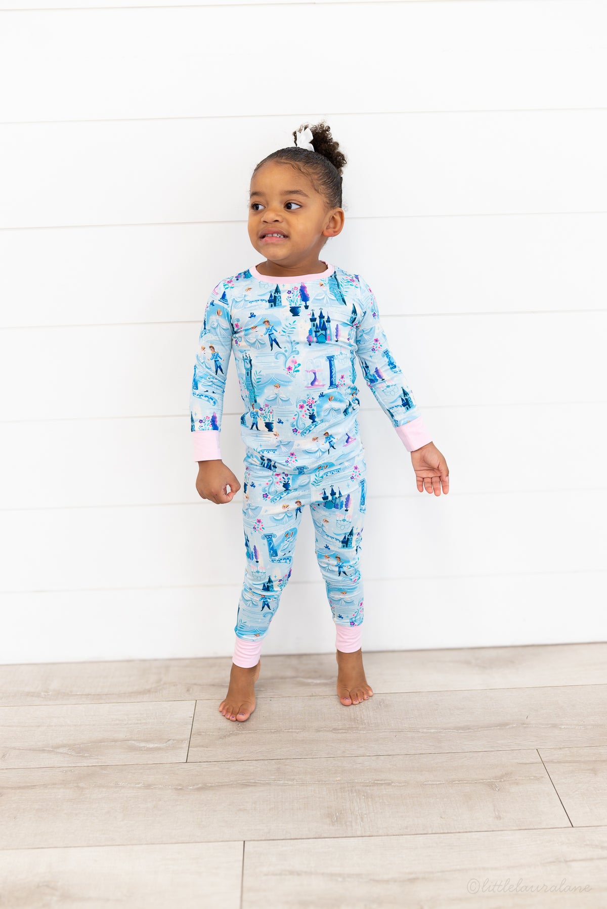 Two Piece Princess Pajama – The Wish Collection – on-model full-length front view, blue castle-print pajamas