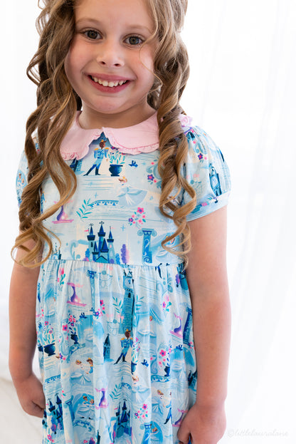 Girls Princess Dress with Shorts – The Wish Collection – close-up on-model, blue castle and glass-slipper print dress