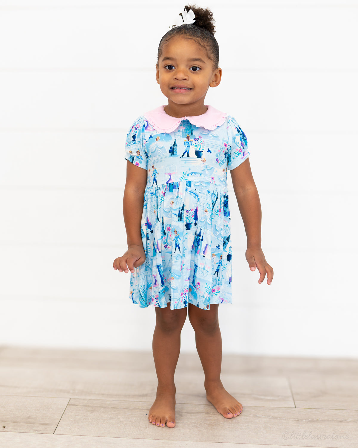 Girls Princess Dress with Shorts – The Wish Collection – on-model full-length front view, blue castle-print dress