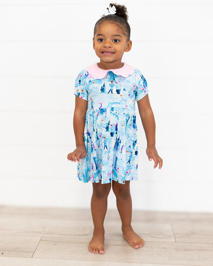 Girls Princess Dress with Shorts – The Wish Collection – on-model full-length front view, blue castle-print dress