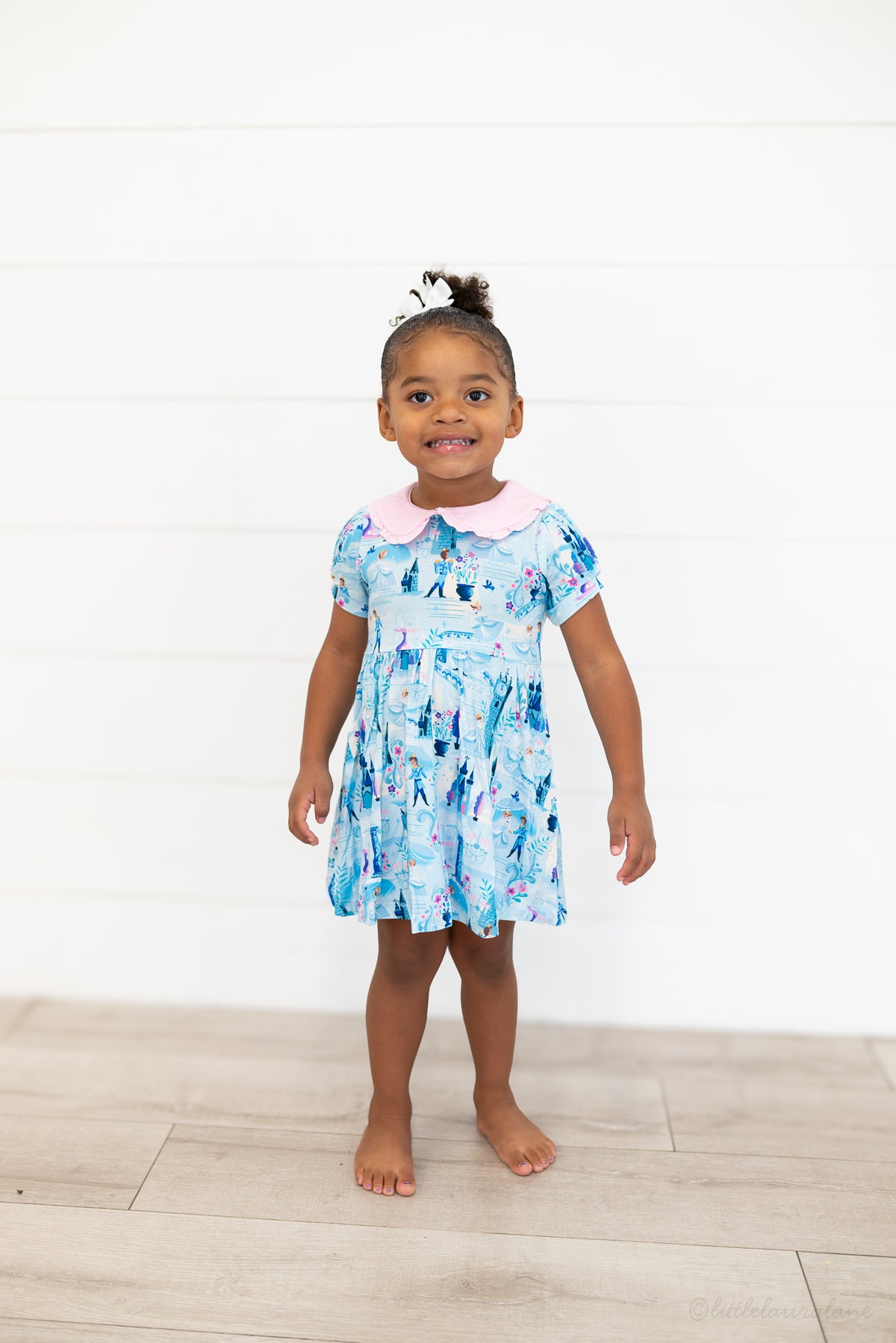 Girls Princess Dress with Shorts – The Wish Collection – on-model full-length front view, blue castle-print dress