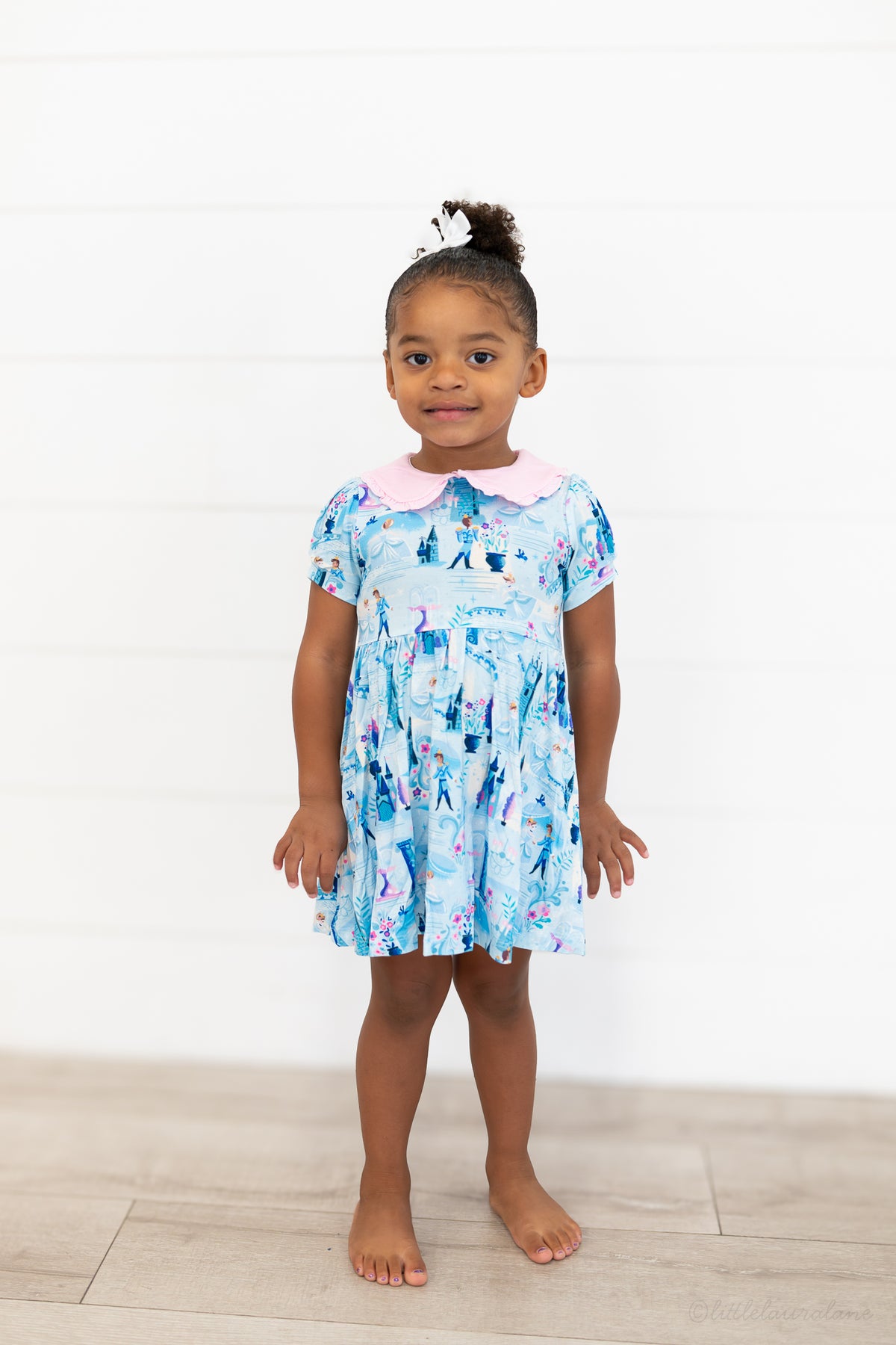 Girls Princess Dress with Shorts – The Wish Collection – on-model full-length front view, blue castle-print dress
