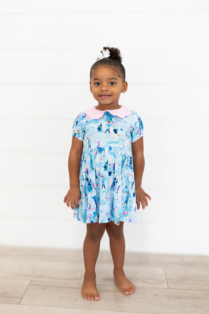 Girls Princess Dress with Shorts – The Wish Collection – on-model full-length front view, blue castle-print dress